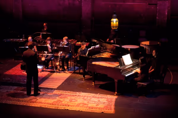 Zachary Bruno conducting Ã¢â‚¬Å“Concerto for Two Pianos, Winds, PercussionÃ¢â‚¬Â. Photo