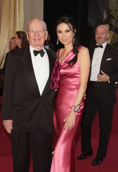 Rupert Murdoch and Wendi Deng pictured at the 83rd Annual Academy Awards - Arrivals h Photo