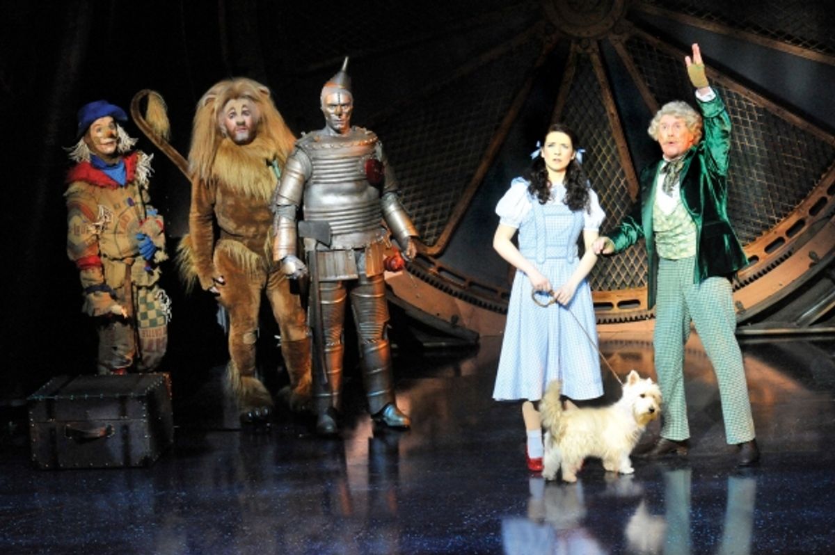 Dorothy (Danielle Hope), Tin Man (Edward Baker-Duly), Lion (David Ganley) meet the Wizard (Michael Crawford).   at 