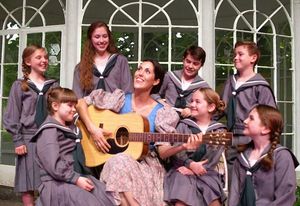 Micah Richerand Desonier as Maria (center), clockwise from upper left is: Annabel Bailey (Brigitta), Karoline Patrick (Leisl), Coldin Grundmeyer (Friedrich), Sawyer Nunes (Kurt), Madison Smither (Louisa), Emma Diagrepont (Gretl), Isabella Wollfarth (Marta @ BroadwayWorld Micah Richerand Desonier as Maria (center), clockwise from upper left is: Annabel Bai Photo