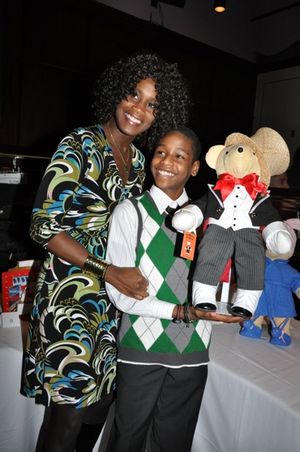 The Scottsboro Boys Bear with Jeremy Gumbs and his mother Deborah Gumbs Photo