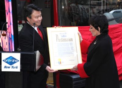 Director of Marketing, Gray Line New York, David W. Chien  & Liza Minnelli being Hono Photo