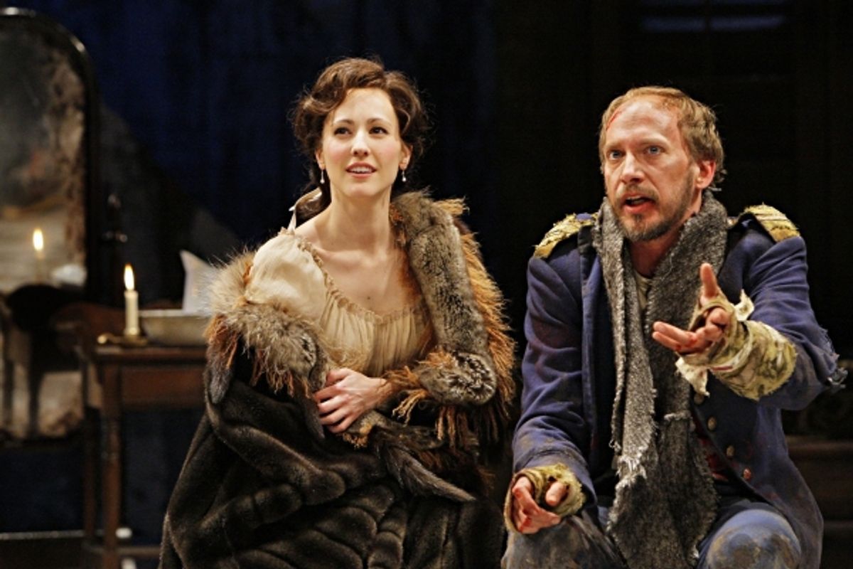  Mariko Nakasone (Raina Petkoff) and Jim Lichtscheidl (Captain Bluntschli) in the Guthrie Theater production of ARMS AND THE MAN by George Bernard Shaw. Directed by Ethan McSweeny, set design by Walt Spangler, costume design by Murell Horton, lighting des at 