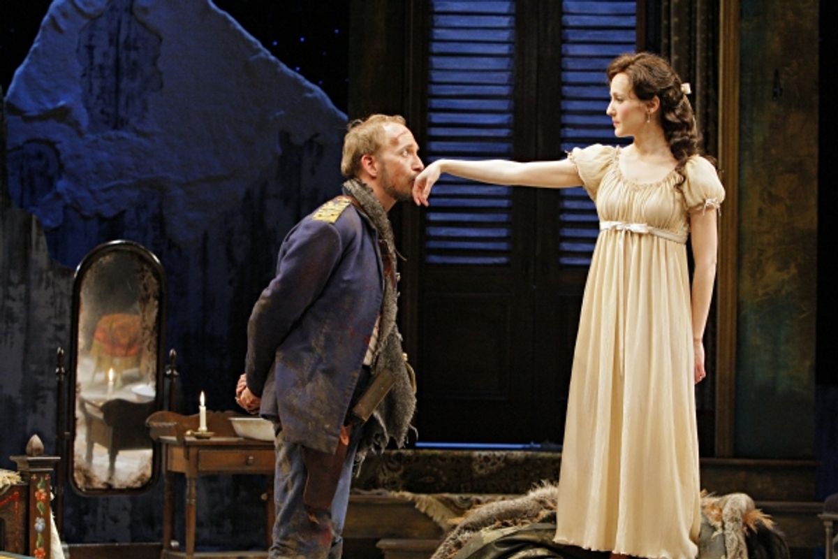  Jim Lichtscheidl (Captain Bluntschli) and Mariko Nakasone (Raina Petkoff) in the Guthrie Theater production of ARMS AND THE MAN by George Bernard Shaw. Directed by Ethan McSweeny, set design by Walt Spangler, costume design by Murell Horton, lighting des at 