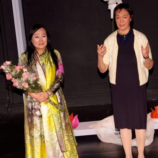 WE ARE opening night curtain call.  Nguyen thi Minh Ngoc with Tisa Chang. Photo by Co Photo