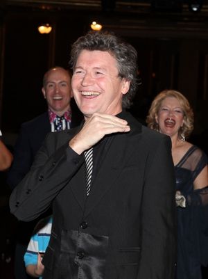 Director Simon Phillips with the ensemble cast viewing video Greetings at the Broadway Opening Night Gypsy Robe Ceremony for 'Priscilla Queen of the Desert - The Musical' at the Palace Theatre in New York City. @ BroadwayWorld Director Simon Phillips with the ensemble cast viewing video Greetings at the Broadwa Photo