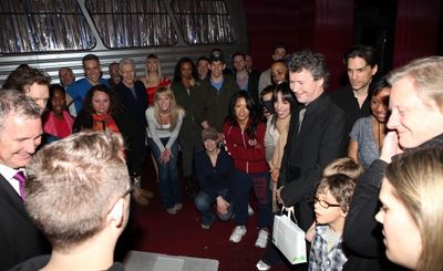 Director Simon Phillips with the ensemble cast viewing video Greetings at the Broadwa Photo