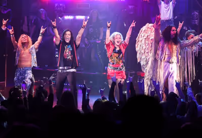 Dan Domenech, Rebecca Faulkenberry, and the cast of Rock of Ages Photo