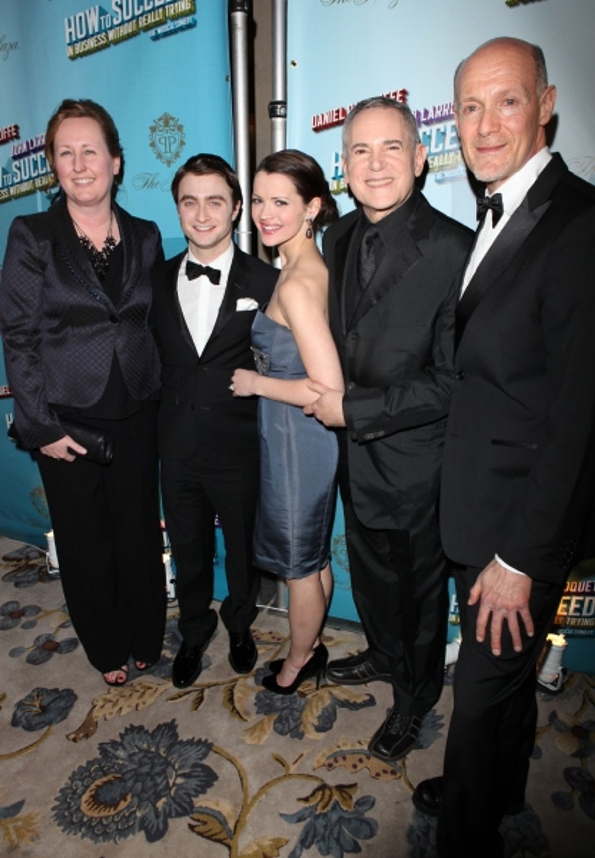 Daniel Radcliffe & Rose Hemingway with producers Craig Zadan & Neil Meron attending the Opening Night Performance After Party for  'How To Succeed In Business...' in New York City. at 