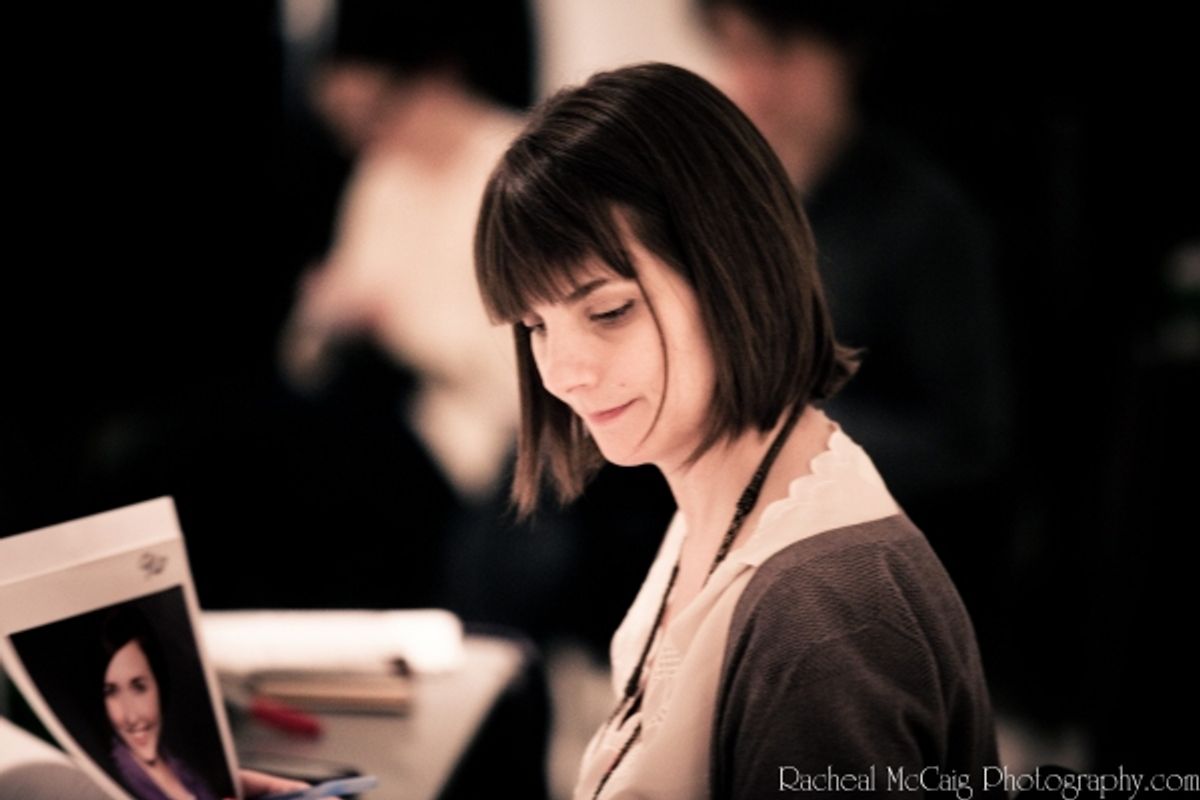 Carrie Gardner peruses the resumes at 