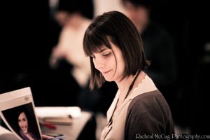 Carrie Gardner peruses the resumes Photo