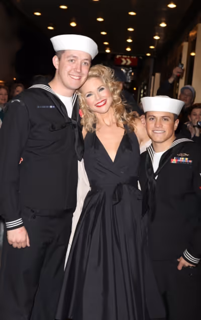  Christie Brinkley with sailors at the stage door greeting fans after making her Broa Photo