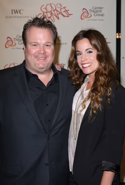 LOS ANGELES, CA - APRIL 13: Actors Eric Stonestreet (L) and Katherine Tokarz (R) pose Photo