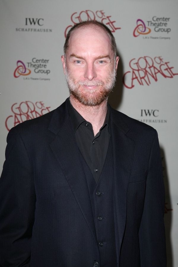 LOS ANGELES, CA - APRIL 13: Hugo Armstrong poses during the arrivals for the opening  Photo