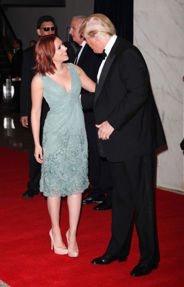 Scarlett Johansson & Donald Trump attending the White House Correspondents' Associati Photo