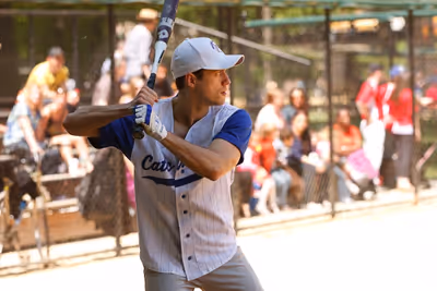 Aaron Tveit in batting practice Photo