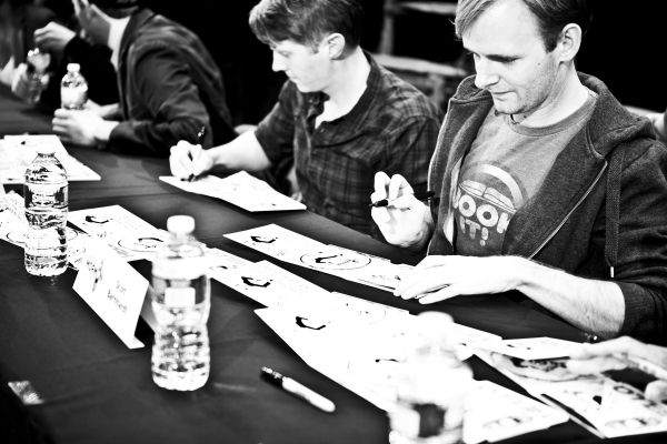 Justin Bohon and Scott Barnhardt signing  Photo