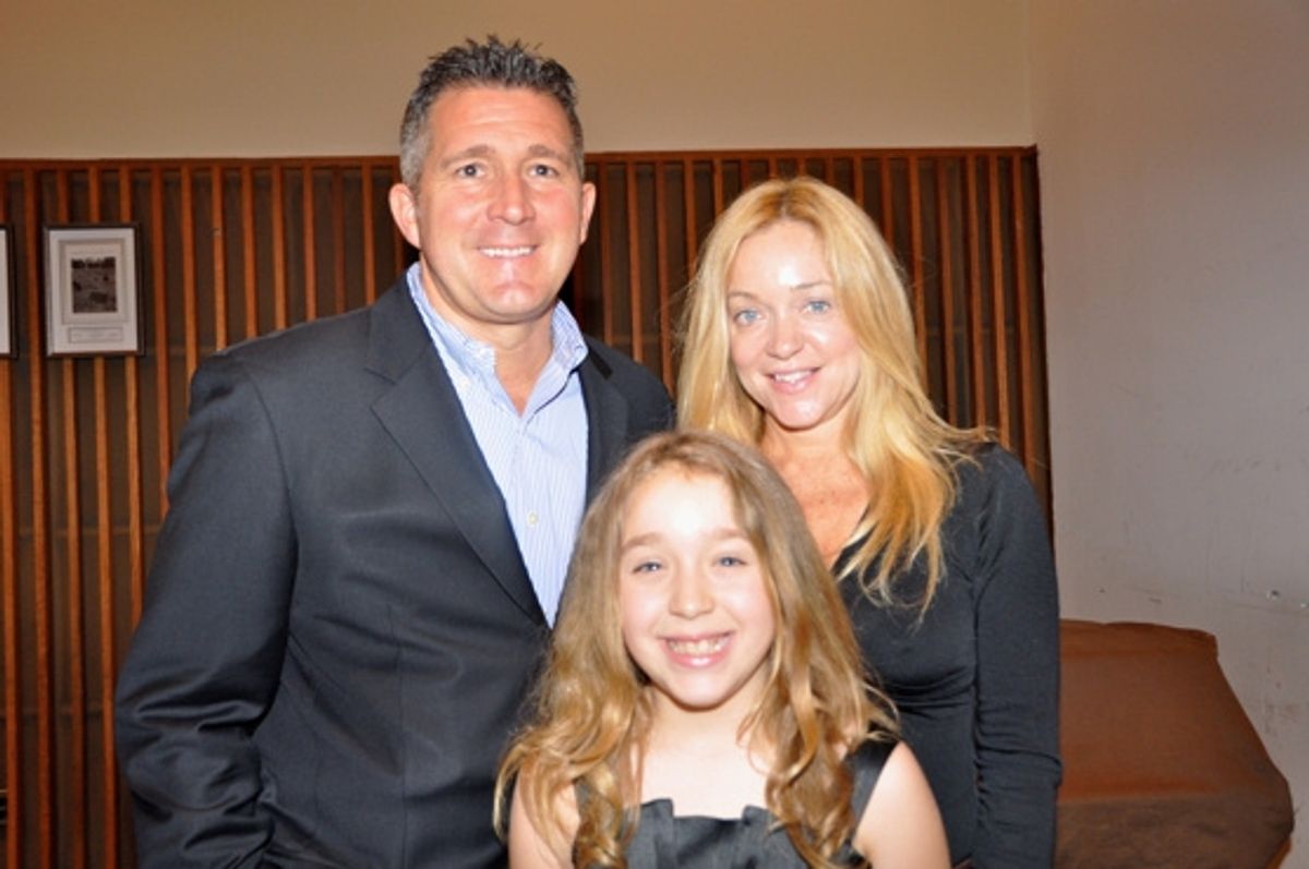 Bill Tompkins, Megan Tompkins with their daughter Tanner Tompkins at 