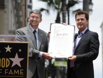  Leron Gubler and Simon Fuller Photo