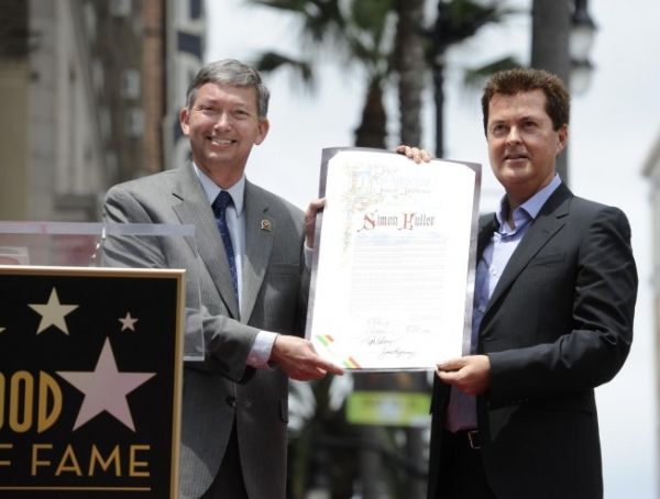  Leron Gubler and Simon Fuller Photo