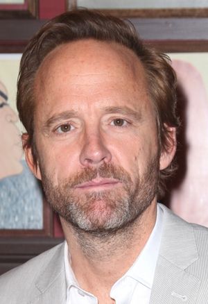 John Benjamin Hickey attends Sardi's unveils Caricatures of 'The Normal Heart' Tony Award Nominees Ellen Barkin, John Benjamin Hickey & Joe Mantello at Sardi's in New York City. @ BroadwayWorld John Benjamin Hickey attends Sardi's unveils Caricatures of 'The Normal Heart' Tony A Photo