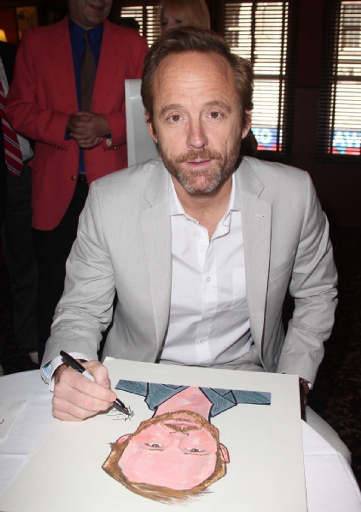 John Benjamin Hickey attends Sardi's unveils Caricatures of 'The Normal Heart' Tony Award Nominees Ellen Barkin, John Benjamin Hickey & Joe Mantello at Sardi's in New York City.  at 