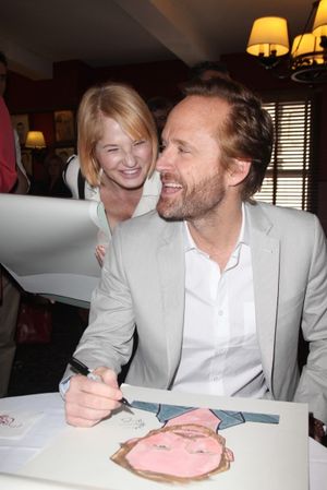 Ellen Barkin & John Benjamin Hickey attends Sardi's unveils Caricatures of 'The Normal Heart' Tony Award Nominees Ellen Barkin, John Benjamin Hickey & Joe Mantello at Sardi's in New York City. @ BroadwayWorld Ellen Barkin & John Benjamin Hickey attends Sardi's unveils Caricatures of 'The Norma Photo