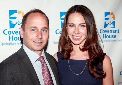 Brian Cashman and former first daughter Barbara Bush Photo