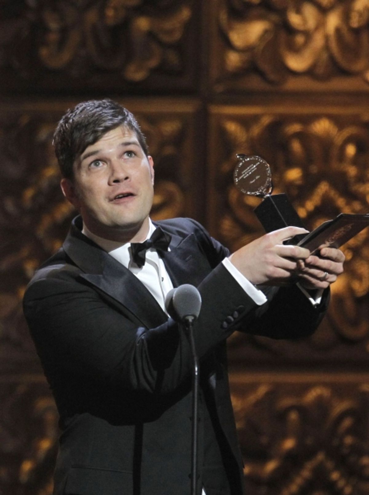 Stephen Oremus, accepts the Tony Award for Best Orchestrations for the musical 'The Book of Mormon' during the American Theatre Wing's 65th annual Tony Awards ceremony in New York, June 12, 2011 at 