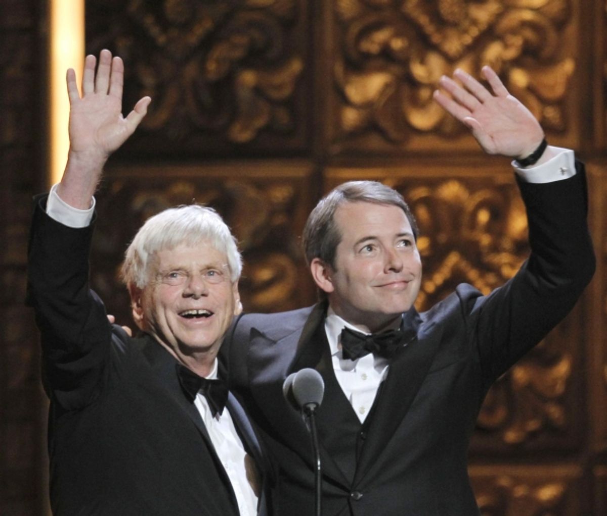 Actors Robert Morse and Matthew Broderick wave from onstage during the American Theatre Wing's 65th annual Tony Awards ceremony in New York, June 12, 2011 at 