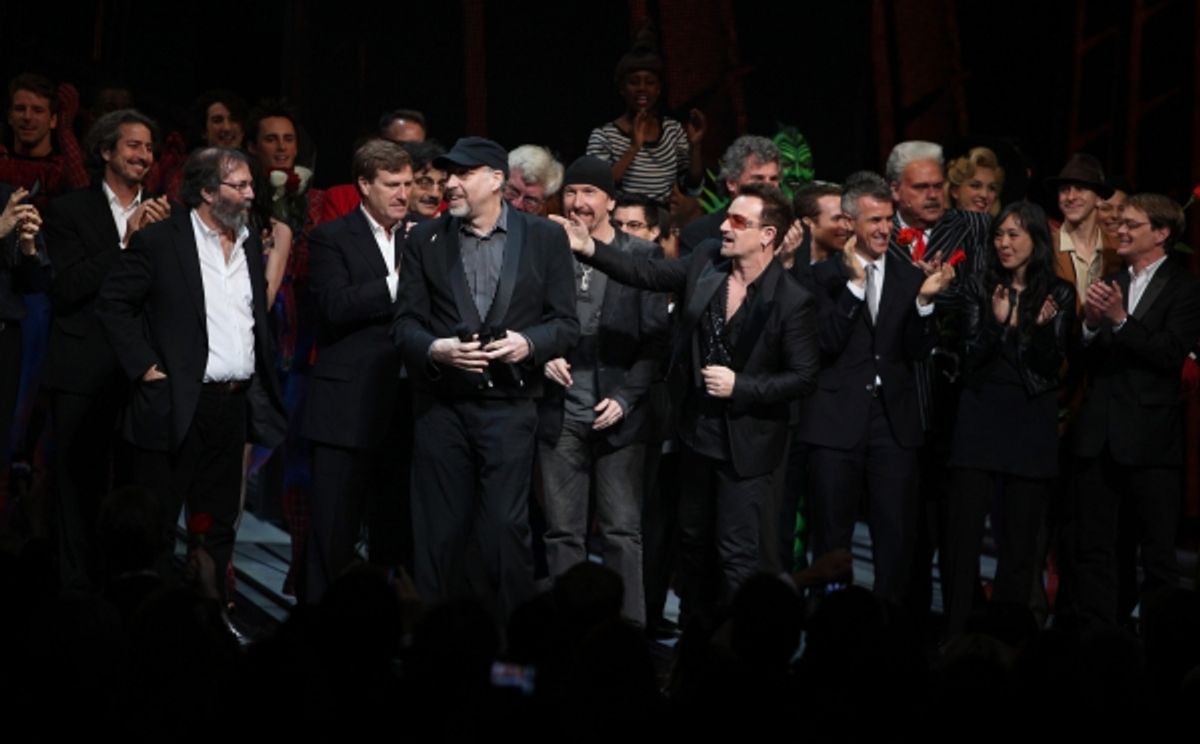 The Edge and Bono  with the ensemble company during the ''Spider-Man Turn off the Dark'' Opening Night Curtain Call in New York City.  at 
