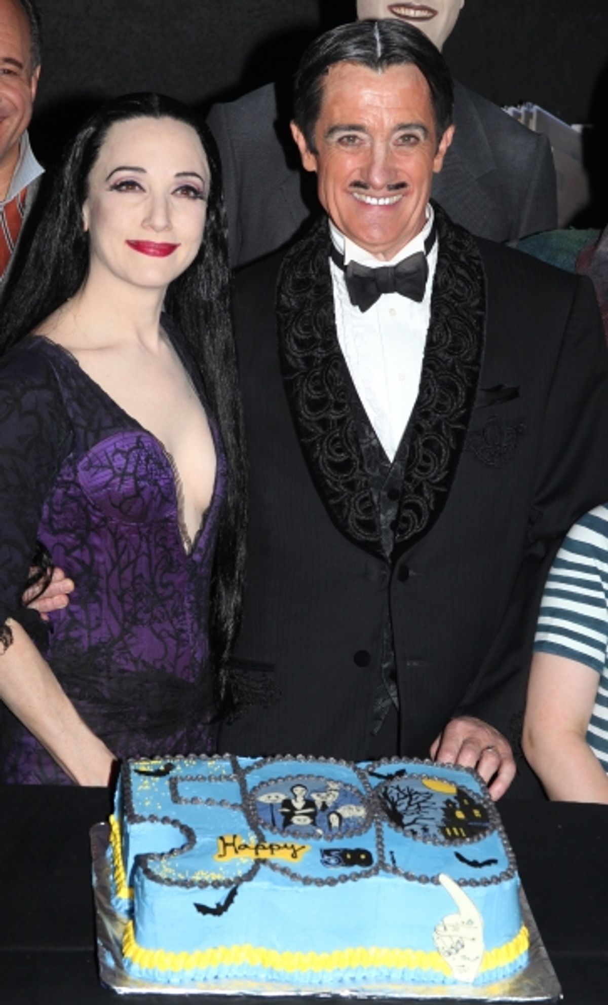 Bebe Neuwirth & Roger Rees with the cast of 'The Addams Family' celebrating their 500th performance with a special cake-cutting backstage at the Lunt Fontanne Theatre in New York City.  at 