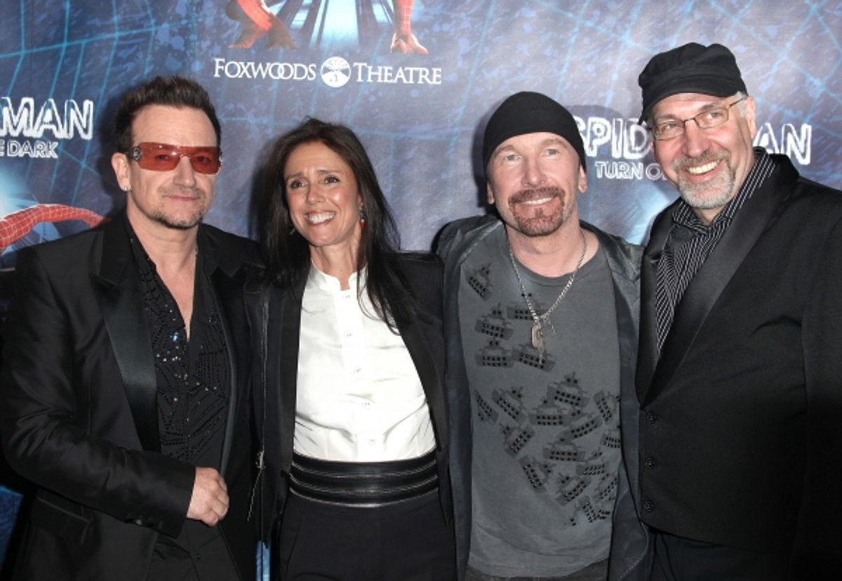 (L-R) Bono, director Julie Taymor, The Edge and director Philip William McKinley attending the Opening Night Performance of 'Spider-Man Turn Off The Dark' at the Foxwoods Theatre in New York City. at 