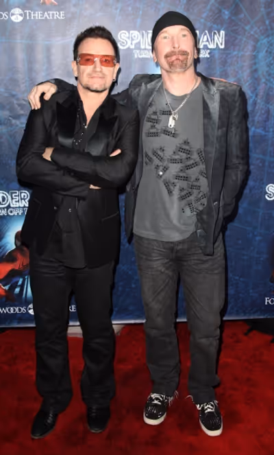 Bono & The Edge attending the Opening Night Performance of 'Spider-Man Turn Off The D Photo
