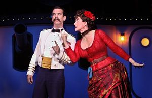 Robert O. Berdahl (Captain Corcoran) and Christina Baldwin (Buttercup) in the Guthrie Photo