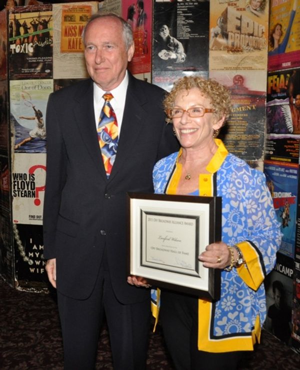 Marshall Mason and Tanya Berezin  accepting on the behalf of Langord Wilson who is in Photo