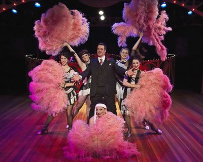Kerby Thompson as Billy Flynn with ensemble girls Jennifer Holcomb, Katy O'Donnell, S Photo