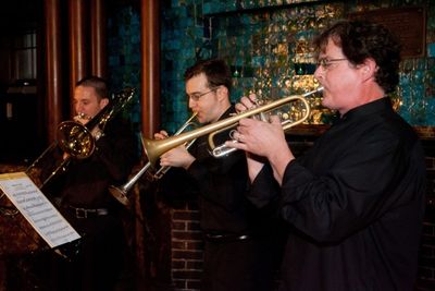 Members of the New York Philharmonic performing a Fanfare composed by incoming chair  Photo