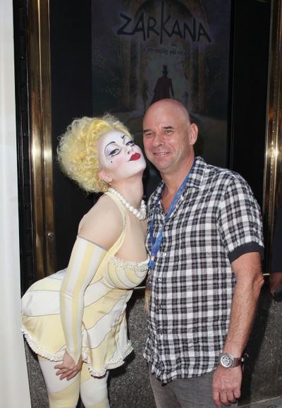Cique du Soleil founder Guy Laliberte with Characters of Zarkana attending the Openin Photo