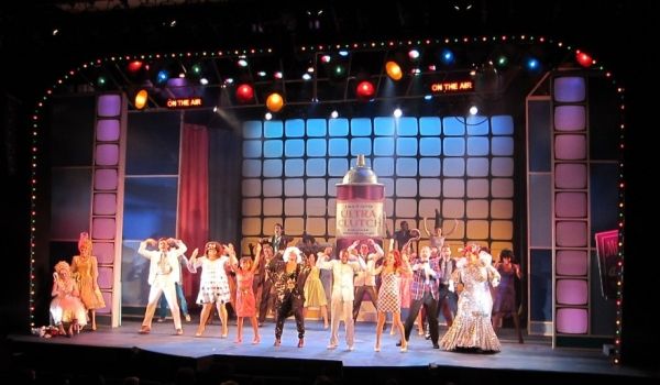 Felicia Finley (Velma), Ashley Moniz (Amber) and the cast for the finale. Photo