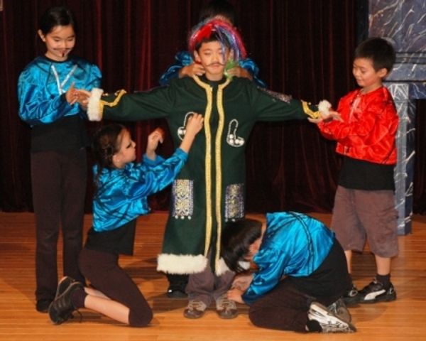 Brian Chiang (center) as king. Photo