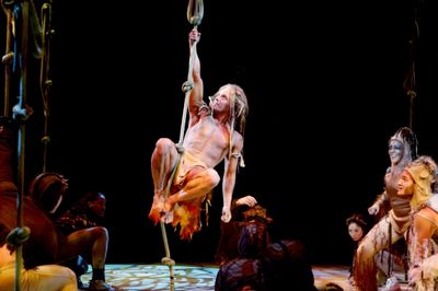 Brian Justin Crum (Tarzan) and ensemble Photo