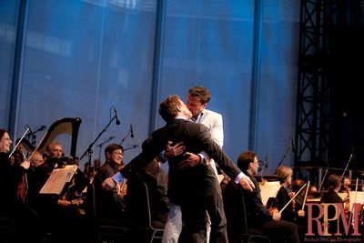 Raul Esparza plants a big one on Martin Short Photo