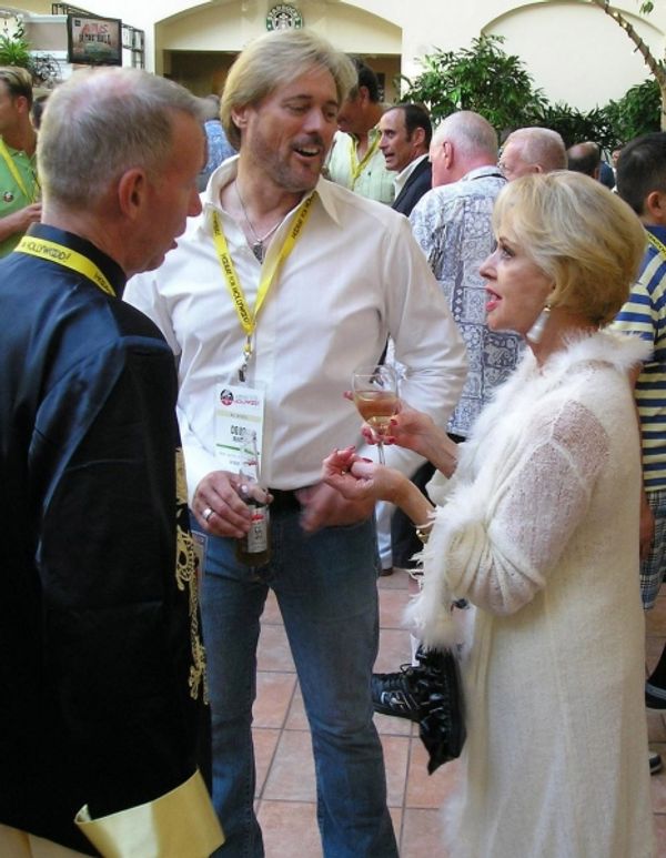 Club members Mark Taylor and Douglas Brown chat with Tippi Hedren at pre-show recepti Photo