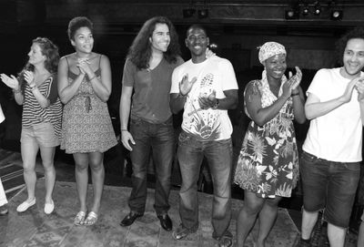 Steel Burthardt & Mike Evariste with Ensemble Cast celebrating the Opening Night Gyps Photo