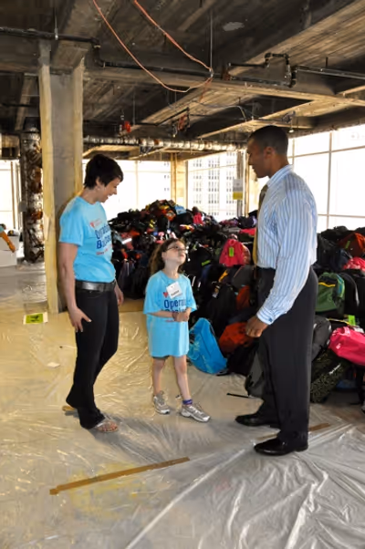 Paige Davis and Mike Woods at the completed backpack area Photo