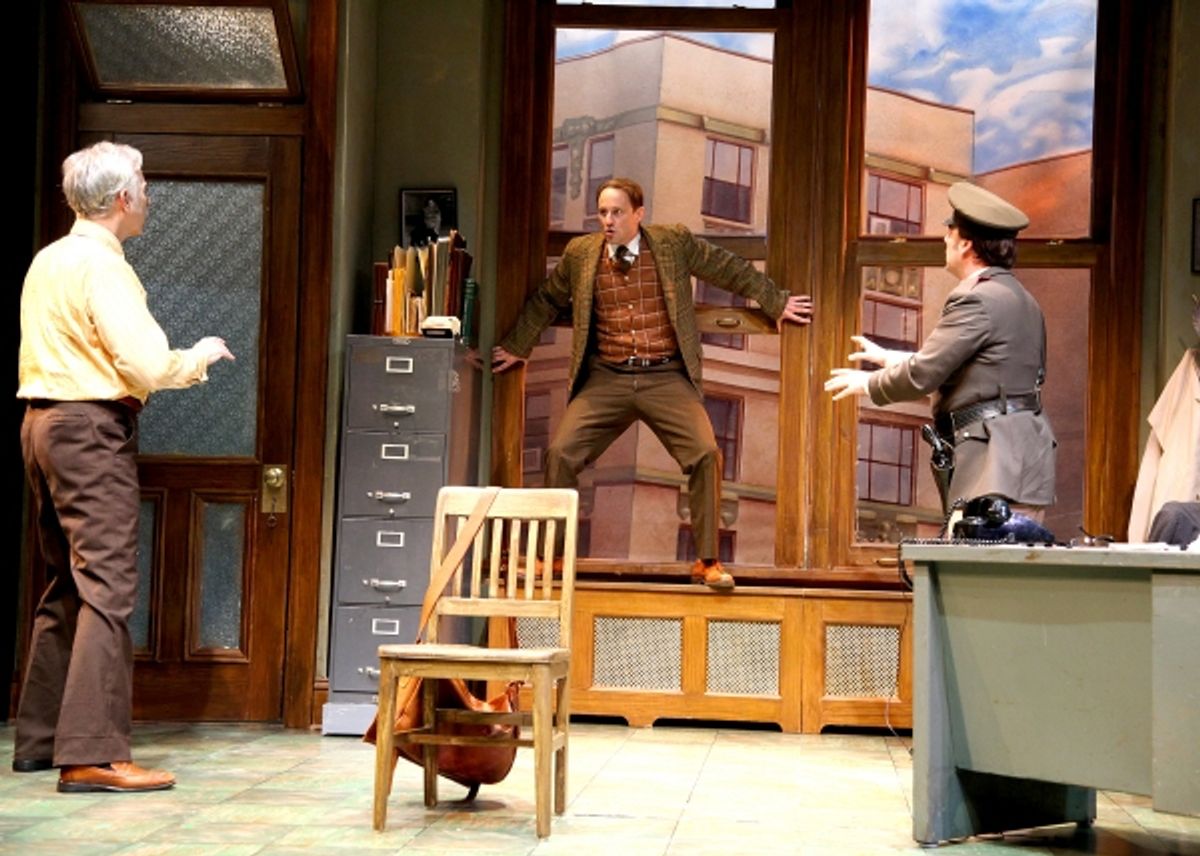 Kevin Isola as the Maniac creates havoc as he is interrogated by Inspector Bertozzo, played by Philip Goodwin at 