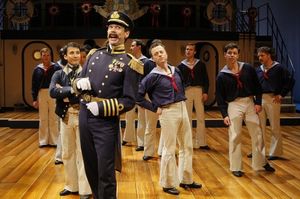 Robert O. Berdahl (Captain Corcoran) and the sailors of H.M.S. PINAFORE. Photo