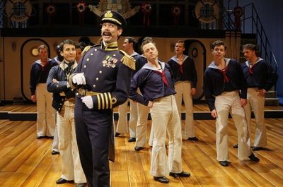 Robert O. Berdahl (Captain Corcoran) and the sailors of H.M.S. PINAFORE. Photo