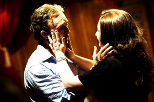 James Kautz as Robert Wyatt and Vanessa Vache as Caroline Wyatt in Pink Knees on Pale Photo